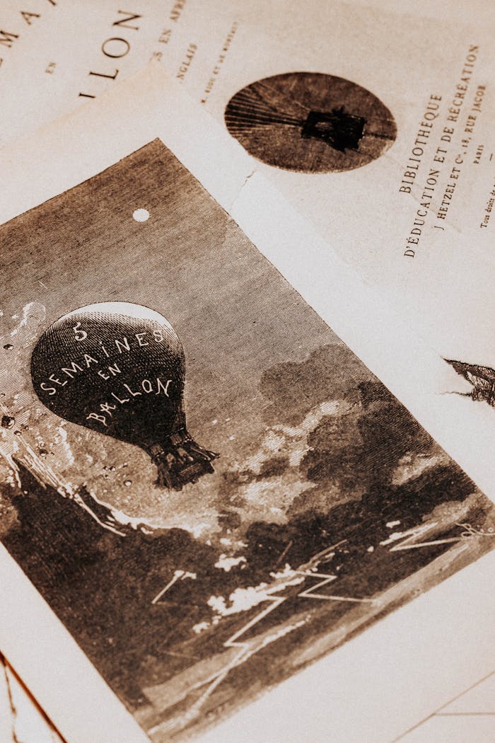 Antique print depicting a hot air balloon with French text, exuding a vintage aesthetic.